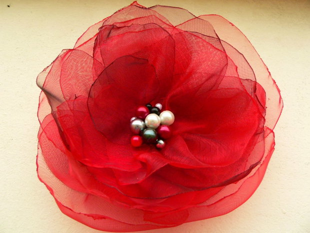 "Lady with red flower"