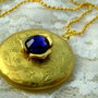 GOLDEN SWAROVSKI LOCKET