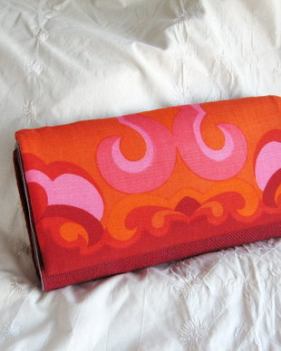 Orange, pink clutch
