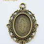 Rama finisaj bronz dantelata de camee sau cabochon 26x36 mm (cu agatatoare)