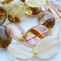 Cuart rutilat oval mare 25x18x8 mm.jpg