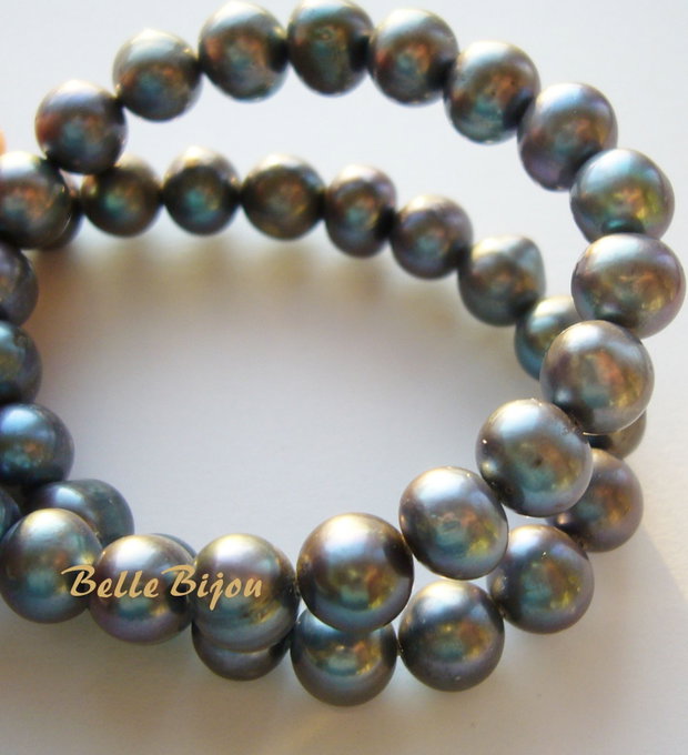 Perle de cultura gri petrol cu irizatii 8.5-9x7.5-8 mm