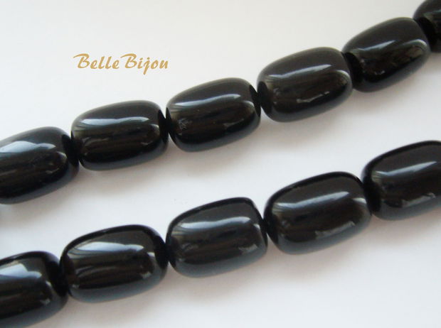 Agate negre butoiase aprox 14x10 mm