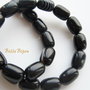 Agate negre butoiase aprox 14x10 mm