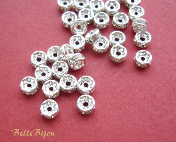 Distantiere rhinestone argintii 4x2 mm cu cristale culoare cristal-clear