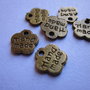 Charm bronz "HandMade" aprox 8 mm