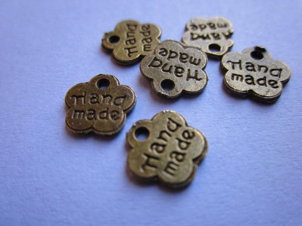 Charm bronz "HandMade" aprox 8 mm