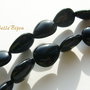 Onix briolete aprox 6x12x16 mm