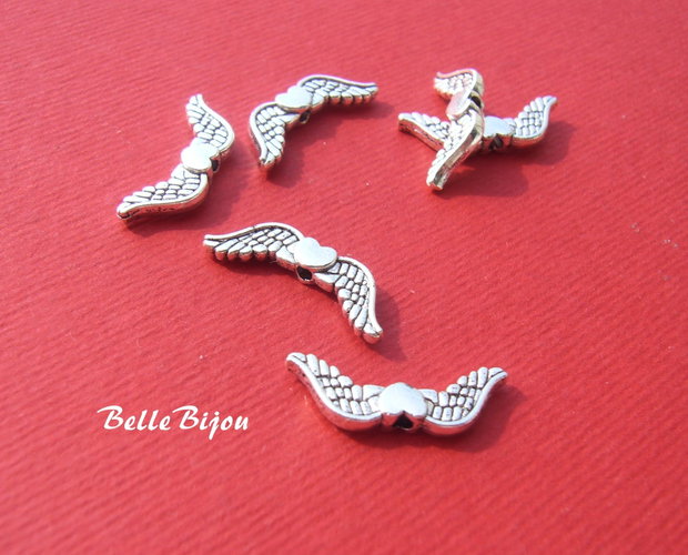 Inimioare cu aripi argintii antichizate 3x7x20 mm