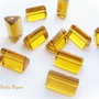 Margele sticla culoarea chihlimbarului triunghiulare in sectiune 15x8.5 mm