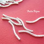 Tub argintiu stralucitor in forma de "S" stilizat si stantat 25x2 mm