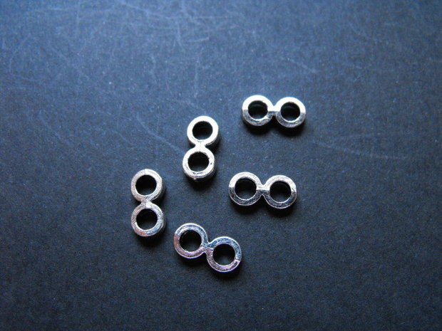 DISTANTIER  PT. SNUR 2 ORIFICII - 11 X 5 MM