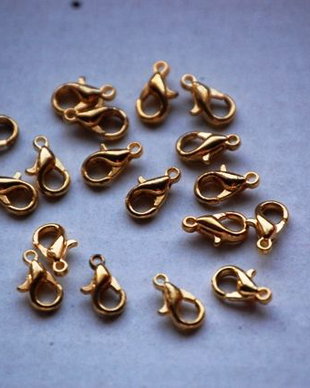 LI10 - incuietoare carabina aurie - 5x10 mm