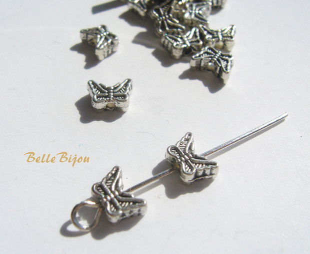Fluturas argintiu antichizat 3x5x7 mm