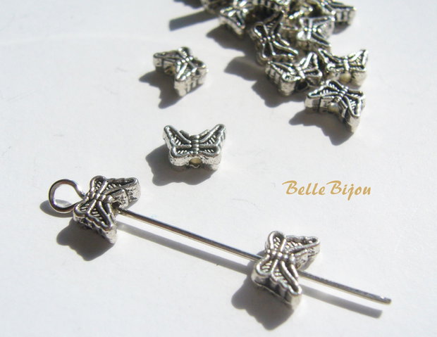 Fluturas argintiu antichizat 3x5x7 mm