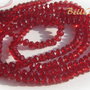 (10 b) Cristale rosii din sticla fatetata aprox 4x2.5-3 mm
