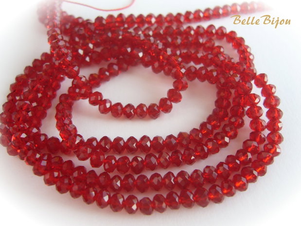 (10 b) Cristale rosii din sticla fatetata aprox 4x2.5-3 mm