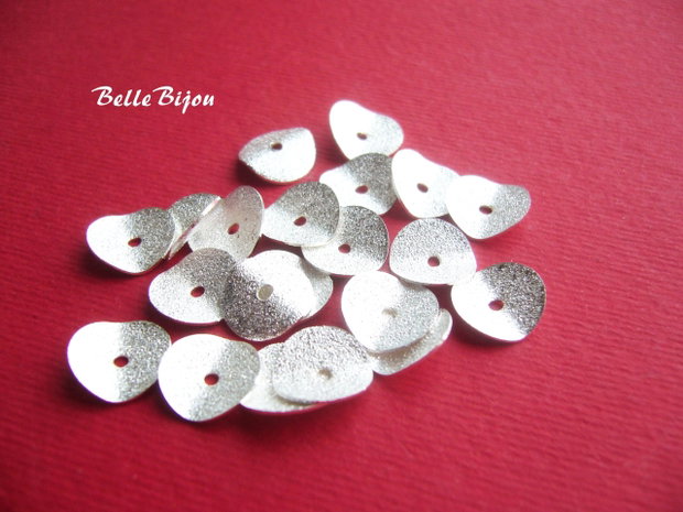 (10 buc) Capacele argintiu deschis, stardust, de diametru aprox 10 mm