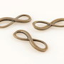 S807 Conector infinit bronz 23x8mm