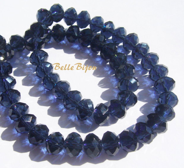 Cristale din sticla fatetate albastru inchis aprox 10x8 mm