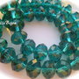 Cristale din sticla fatetate verde smarald aprox 10x7 mm