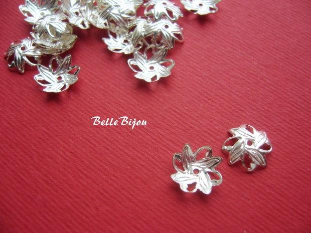 Capacel ornamental placat cu argint