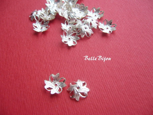 Capacel ornamental placat cu argint