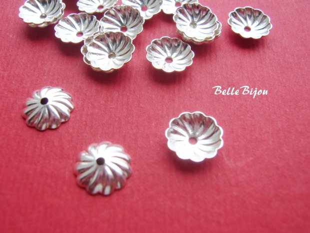 Capacel argintat aprox 2x7 mm