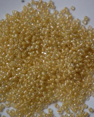 LMN212 - (50g) margele nisip transparent cu miez galben 2 mm