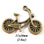 3680 - (2 buc) Charms bronz bicicleta