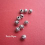 Margica mica, tub cu model floral din argint antichizat INDIA aprox 4x4.5 mm