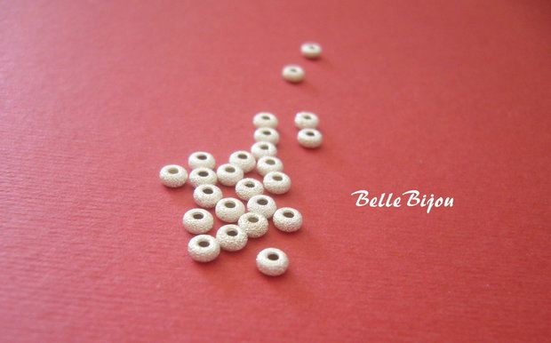 Margele stardust din argint 925 nuanta deschisa aprox 3x2.5 mm
