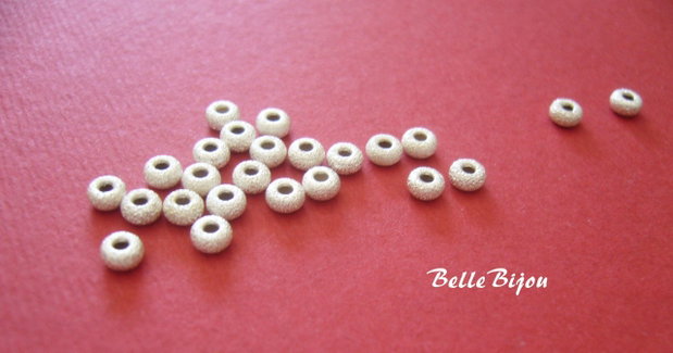 Margele stardust din argint 925 nuanta deschisa aprox 3x2.5 mm
