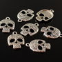 U973 Charms craniu argintiu antic 24x16mm