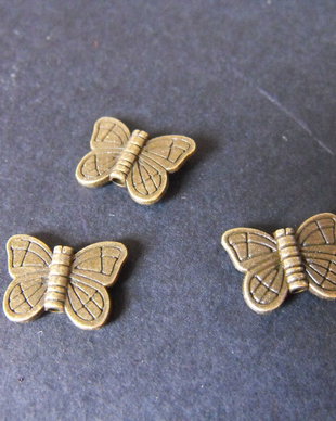 DISTANTIER BRONZ FLUTURE - 15 X 11 MM