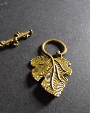 INCHIZATOARE BRONZ FRUNZA -  37 X 22 MM