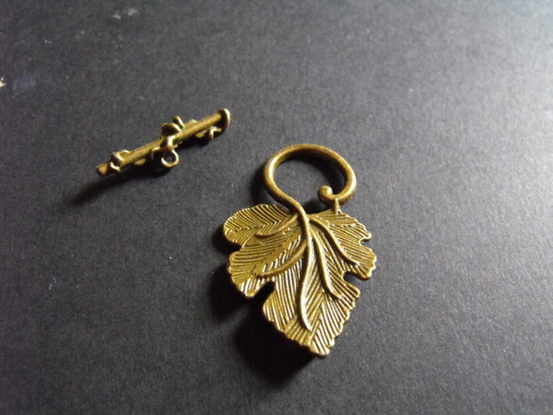 INCHIZATOARE BRONZ FRUNZA -  37 X 22 MM