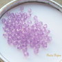 (10 b) Cristale biconice mov lila din acril aprox 5 mm