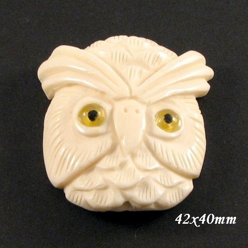 4191 - Pandantiv, os sculptat manual,  bufnita