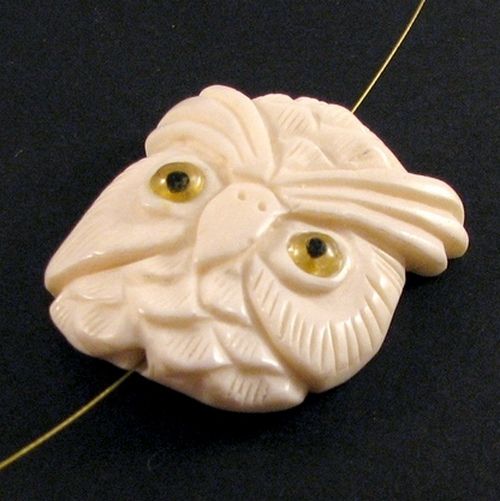 4191 - Pandantiv, os sculptat manual,  bufnita