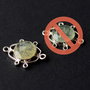 1b Conector cu prehnit fatetat in rama decorativa placata cu argint