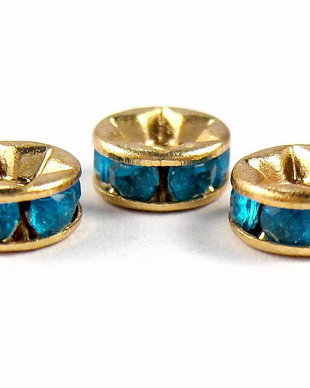 Distantiere aurii cu strasuri albastre, 6x3 mm