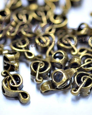 Charm distantier cheia sol bronz, 18x9x6mm