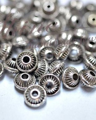 Distantier bicone, argintiu antichizat, 7x5mm