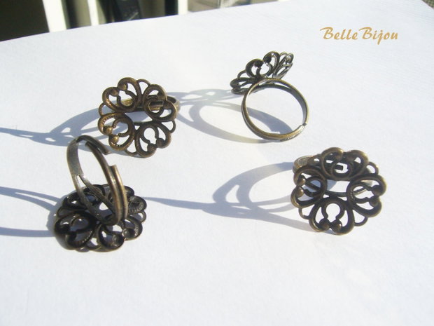 Baza inel reglabila finisaj bronz cu model dantelat usor arcuit de aprox 20 mm