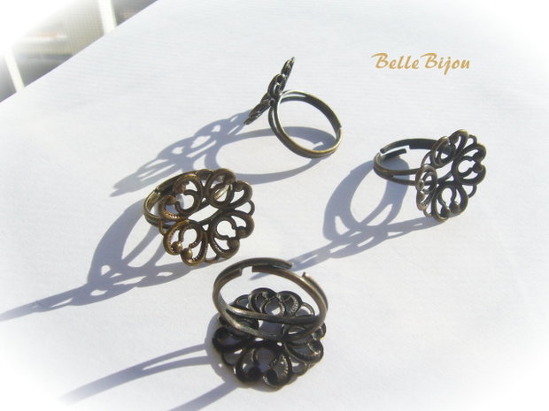 Baza inel reglabila finisaj bronz cu model dantelat usor arcuit de aprox 20 mm