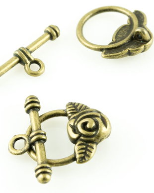 I130 Inchizatoare bronz rotunda cu floare 19x17mm