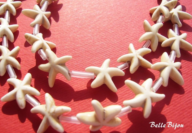 Howlit alb in forma de stelute de mare aprox  14x5 mm