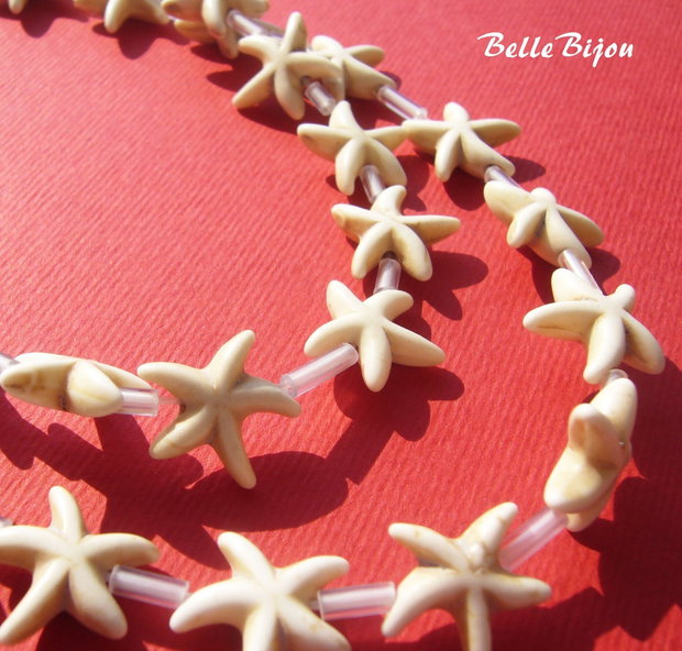 Howlit alb in forma de stelute de mare aprox  14x5 mm