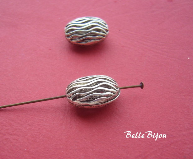 Margele mari ovale argintii antichizate aprox 9x13x17mm